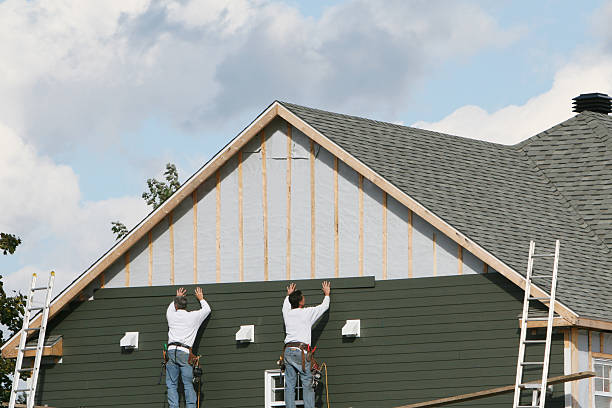 Professional Emergency Siding Repair technician working in Tipp City, OH